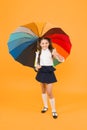 Everything under control. Fancy schoolgirl. Girl with umbrella. Rainy day. Happy childhood. Rainbow umbrella. Kid happy