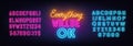 Everything Will Be Ok neon lettering on brick wall background. Royalty Free Stock Photo