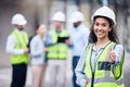 Everythings under control. a young female architect showing a thumbs up at a building site. Royalty Free Stock Photo