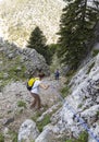 Evia Island, Greece. April 2020:  Tourists climb the mountains on a Hiking trail in the forest in the Dirfis mountains on the Gree Royalty Free Stock Photo
