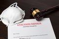 Eviction notice document with gavel and N95 face mask