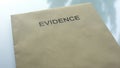 Evidence, folder with important documents lying on table, police investigation Royalty Free Stock Photo