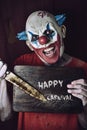 Evil clown and text happy carnival Royalty Free Stock Photo