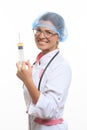 Evil doctor with big syringe Royalty Free Stock Photo