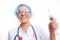 Evil doctor with big syringe Royalty Free Stock Photo