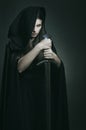 Evil expression of beautiful dark woman Royalty Free Stock Photo