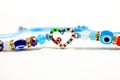 Evil eye children summer bracelet . Mediterranean people believed that evil eye keeps evil things away. Isolated on the white