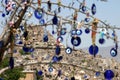 Evil eye in tree behind Uchisar Castle in Cappadocia Royalty Free Stock Photo