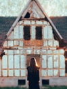 Evil Ghost in Front of a Horror Haunted Abandoned House