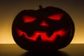 Evil Halloween Pumpkin with light inside Royalty Free Stock Photo