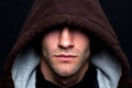 Evil looking hooded man Royalty Free Stock Photo