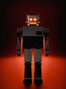 Evil metallic robot on red background, artificial intelligence retro 60s - Robot metÃÂ¡lico malvado en fondo rojo, inteligencia Royalty Free Stock Photo