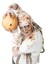 Evil mummy is holding pumpkin