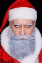 Evil Santa Claus angrily looks at the camera Royalty Free Stock Photo