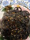 close-up of spaghetti with squid ink Royalty Free Stock Photo