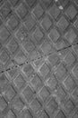 Black and white texture of metal plate with embossed square patterns Royalty Free Stock Photo