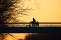 Sunset Ride: Cyclist's Silhouette Against Twilight Royalty Free Stock Photo