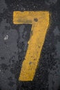 Number seven painted on the concrete