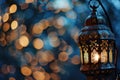 In this evocative image, a radiant Ramadan lantern illuminates the surroundings, symbolizing the holy month's