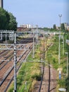 View of train tracks with a passing train Royalty Free Stock Photo