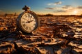 Evoking urgency clock placed on cracked, arid soil, a profound image