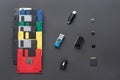 The evolution of digital data storage device. Floppy disks, flash drives and memory cards. Isolated on dark background. Royalty Free Stock Photo