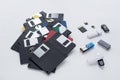 The evolution of digital data storage device. Floppy disks, flash drives and memory cards isolated on white background Royalty Free Stock Photo