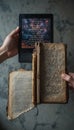 Evolution of Reading: Digital E-reader and Ancient Print Book Royalty Free Stock Photo