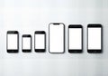 Evolution of smartphone design showcasing various models and screen sizes Royalty Free Stock Photo