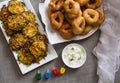 Ewish holiday Hanukkah traditional food symbols: , `Sfinj ` - Moroccan Donuts and potato latkes. Background