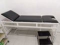 Examination bed for patient with stel ladder