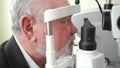 examination of elderly man with slit lamp. equipping ophthalmologist's office.