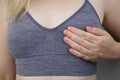 A woman suffers from chest pain. On examination by a gynecologist-mammologist. The concept of the prevention of breast diseases, Royalty Free Stock Photo