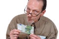 Examining euro banknote Royalty Free Stock Photo