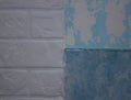 An example of a combination of several types of decorative putty on a wall with tiles. Blue and white stucco is paired