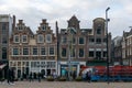 Example of the old tall traditional Dutch buildings in Amsterdam along the canal subsiding, falling down, wonky and crooked. Royalty Free Stock Photo