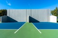 Photo of an outside American Handball courts with concrete wall, located at a park or school. Royalty Free Stock Photo