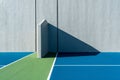 Photo of an outside American Handball courts with concrete wall, located at a park or school. Royalty Free Stock Photo