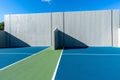 Photo of an outside American Handball courts with concrete wall, located at a park or school. Royalty Free Stock Photo