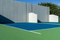 Photo of an outside American Handball courts with concrete wall, located at a park or school. Royalty Free Stock Photo