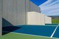 Photo of an outside American Handball courts with concrete wall, located at a park or school. Royalty Free Stock Photo