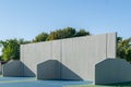 Photo of an outside American Handball courts with concrete wall, located at a park or school. Royalty Free Stock Photo