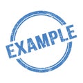 EXAMPLE text written on blue grungy round stamp Royalty Free Stock Photo