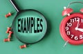 EXAMPLES - word on magnifying glass on a green background with a red clock