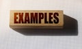 Examples word written on wood block. Education concept