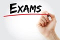 Exams text with marker, business concept background Royalty Free Stock Photo