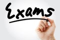 Exams text with marker Royalty Free Stock Photo