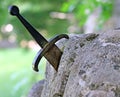 Excalibur the famous sword in the stone of king Arthur Royalty Free Stock Photo