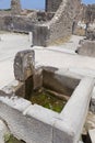 The excavated and preserved fountain in Pompeii