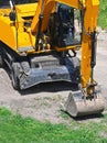 Excavating machine on construction site Royalty Free Stock Photo